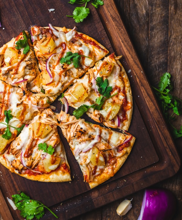 BBQ chicken pizza with red onion and cilantro