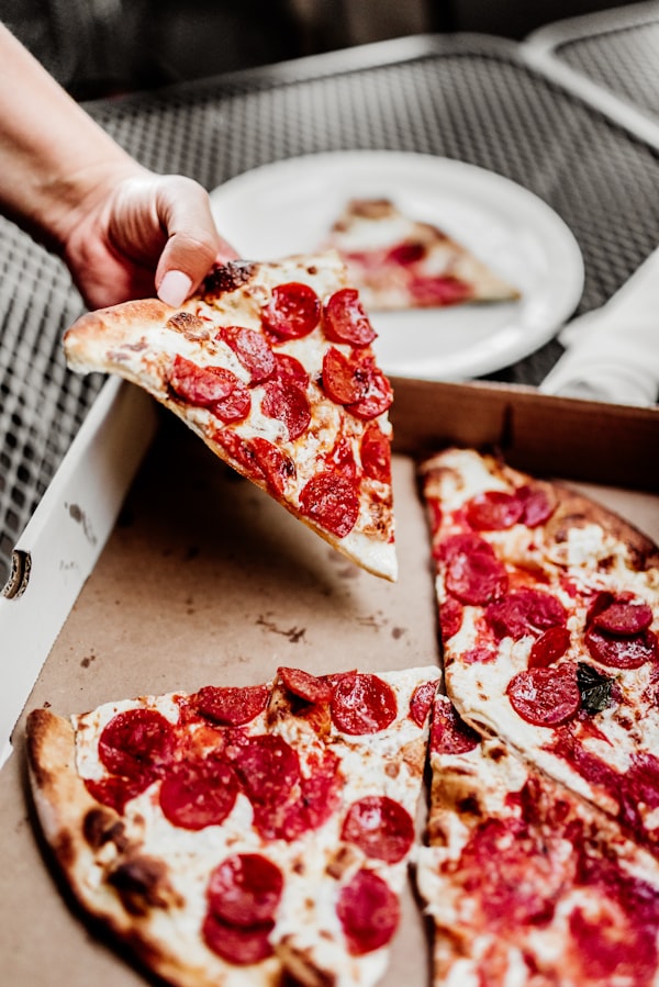 NY-style pepperoni slice with cup-and-char pepperoni