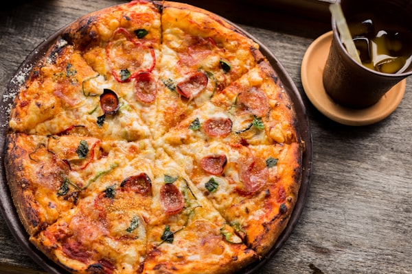 Ganni's Special — loaded combo pizza with pepperoni, sausage, bacon and everything on top